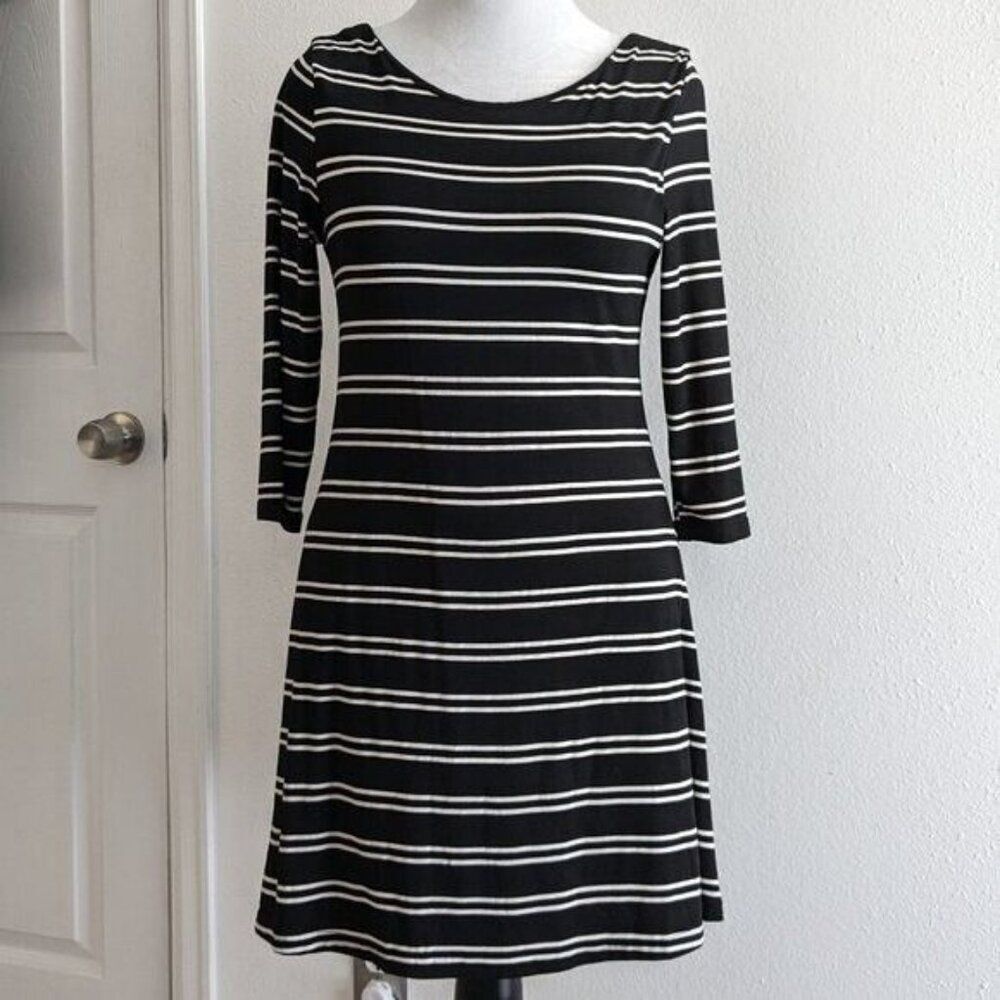 Flattering Black and White striped, V back dress from Lumiere Large